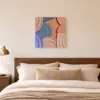 Peach and Teal Arcs by Bassem, canvas on a wall