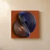 Navy Rings on Rust by Bassem, canvas on a wall