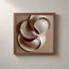 Ivory Loop by Bassem, framed print on a wall
