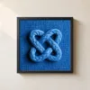 Cobalt Rope Knot by Bassem, framed print on a wall