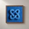 Cobalt Rope Knot by Bassem, framed print on a wall