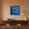 Cobalt Rope Knot by Bassem, framed print on a wall