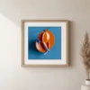Layered Orange Discs by Bassem, art print shown framed on a wall