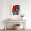 Red and Blue Columns by Bassem, framed print on a wall