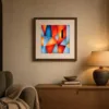 ba-0104-red-and-sky-facets-print-2-room-evening-walnut-v6 Red and Sky Facets by Bassem, art print shown framed on a wall