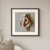 Two Spheres at Rest by Bassem, art print shown framed on a wall