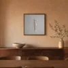Three Quiet Dots by Bassem, framed print on a wall