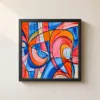 Stained Glass Swirl by Bassem, framed print on a wall