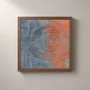 Blue Turns to Orange by Bassem, framed print on a wall