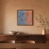 Blue Turns to Orange by Bassem, framed print on a wall