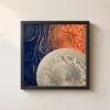 Disc Among Swirls by Bassem, framed print on a wall