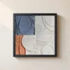 Blue Leaf Quadrants by Bassem, framed print on a wall