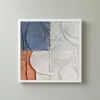 Blue Leaf Quadrants by Bassem, framed print on a wall