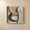 Pebbles and Combed Ribbon by Bassem, canvas on a wall