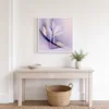 Lone Lily in Lilac by Bassem, framed print on a wall