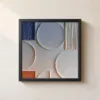 Pale Discs and Pinstripes by Bassem, framed print on a wall