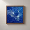 Blossoms Drawn in White by Bassem, framed print on a wall